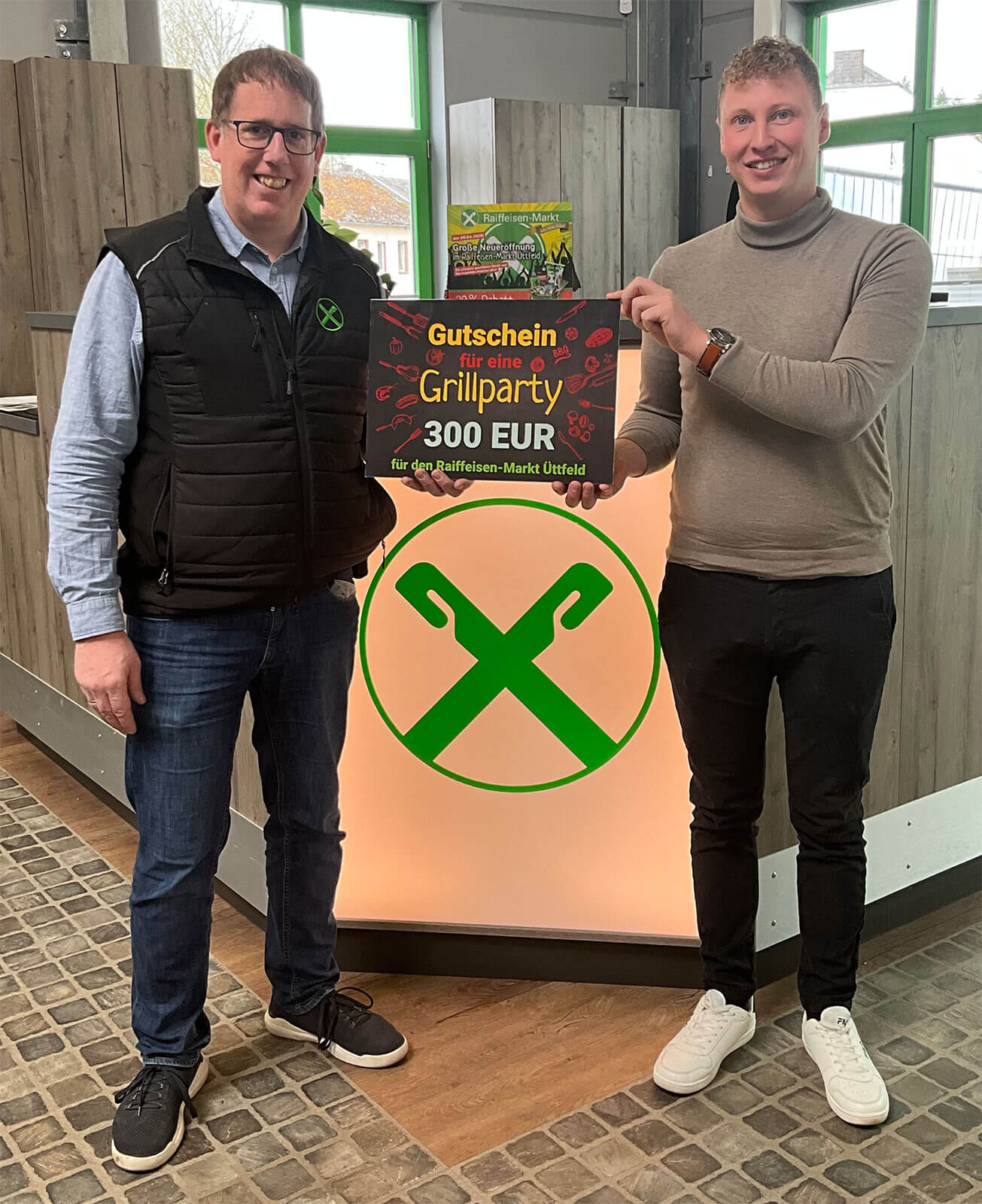 Raiffeisen-Markt Üttfeld – Mittarbeiter mit Grillparty Gutschein über 300 Euro